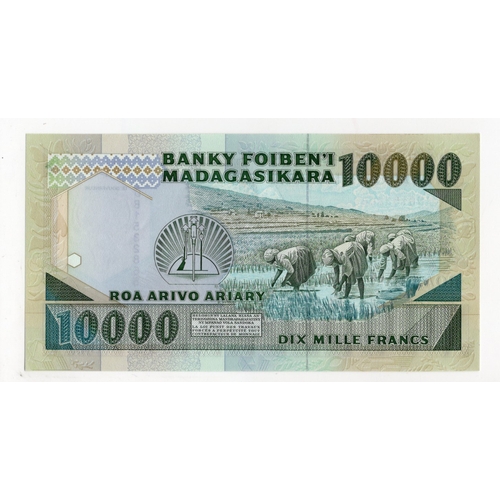 713 - Madagascar 10000 francs issued 1988 - 1994, serial DB1532865 (BNB B308b, Pick74b) Uncirculated