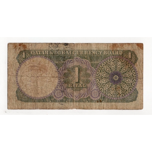 811 - Qatar & Dubai 1 Riyal not dated issued 1960's, serial A/7 626279 (BNB B101a, Pick1a) some dirt, Fine