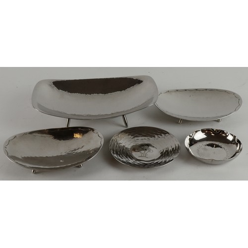 352 - Two Keswick School stainless steel dishes & three Borrowdale stainless steel dishes (two matching), ... 