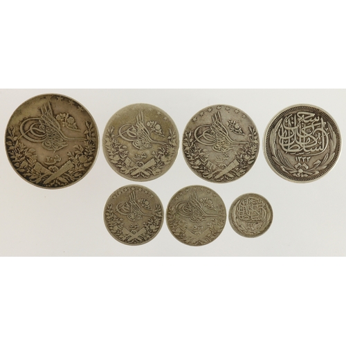 563 - Egypt (7) Ottoman and British Empire silver coins, crown-size to minor, mixed grade.