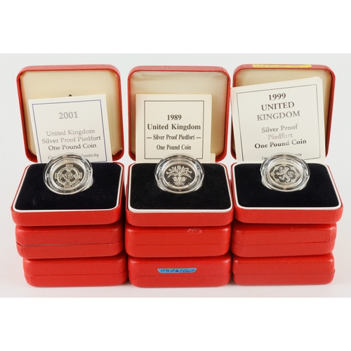 726 - GB Silver Proof One Pound Piedforts (9) 1986, 88, 89, 93, 98, 2000 & 2001 x2. aFDC/FDC boxed as issu... 