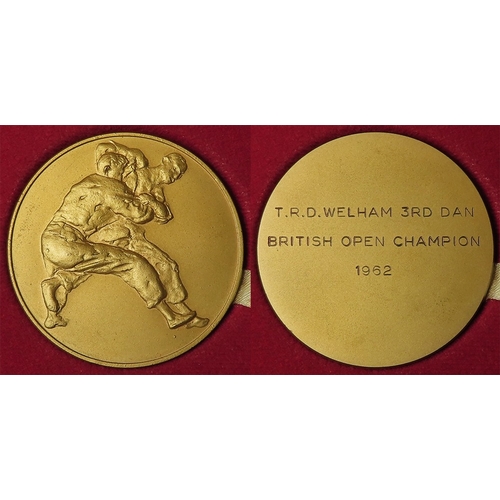 880 - British Sporting Medal (judo): A 55mm gilt bronze medal, reverse engraved 'T.R.D. WELHAM 3RD DAN BRI... 