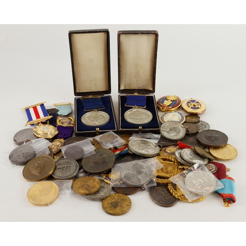 942 - Medals, society jewels, tokens etc (65) noted school medals such as white metal Eton attendance meda... 