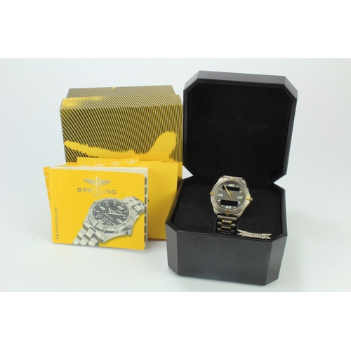 204 - Breitling Aerospace titanium and gold gents quartz wristwatch, ref. F65362, purchased 2001. The grey... 