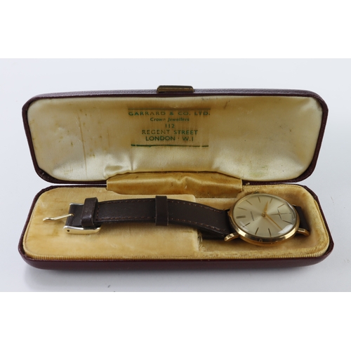 229 - Gents 9ct cased Garrard manual wind wristwatch, circa 1960s. The silvered dial with gilt baton marke... 