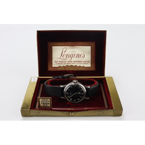 262 - Longines British Military RAF pilots wristwatch, dated 1943. The black dial with Arabic numerals. Ca... 