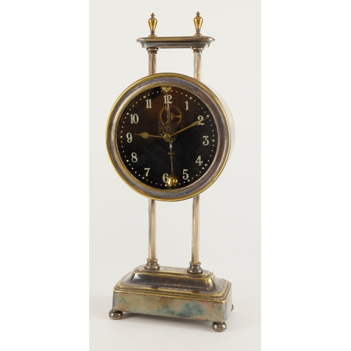 314 - British made brass gravity clock, circa early 20th Century, height  (working intermittently), sold a... 