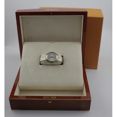 106 - Ebel Wave stainless steel and 18ct gold cased gents quartz wristwatch, ref. A 348381. The silvered d... 