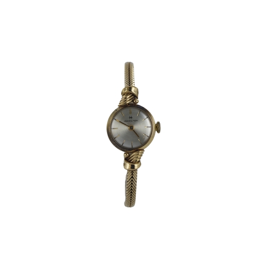 228 - Ladies 9ct cased Hamilton manual wind wristwatch, circa 1960s. The silvered dial with baton markers.... 