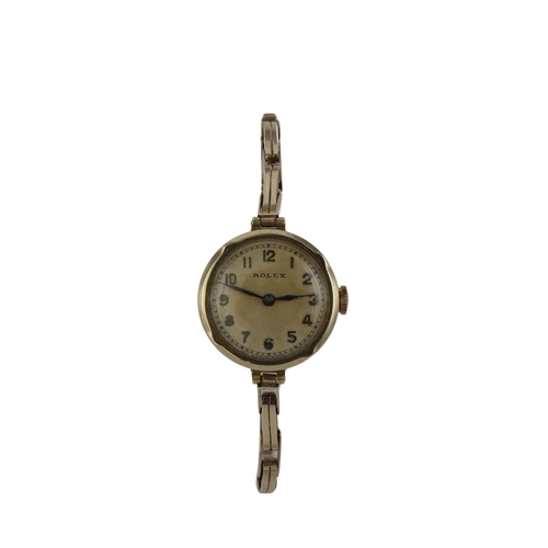 49 - Ladies 9ct cased Rolex manual wind wristwatch, Glasgow import marks 1938. The creamed dial with Arab... 