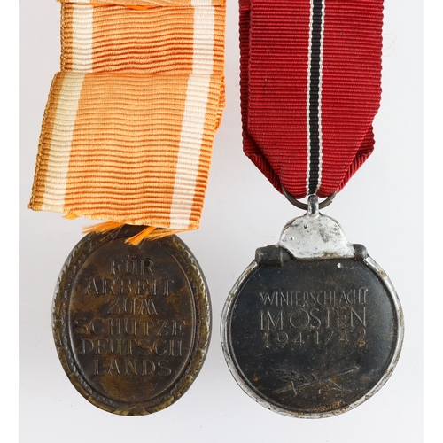 1059 - German Russian front and Westwall medals.