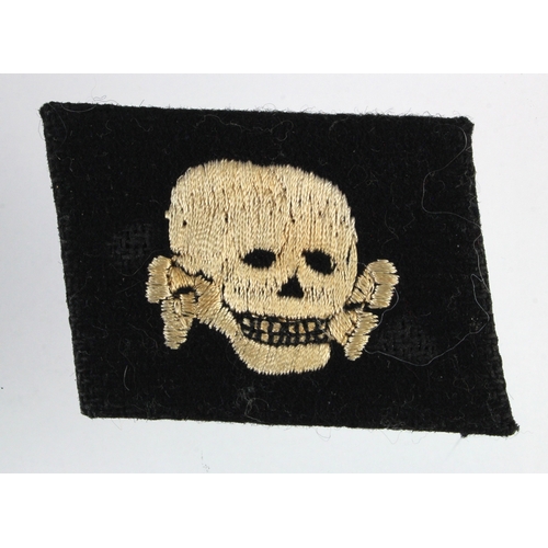 1091 - German SS Totenkopf collar patch Dachu made