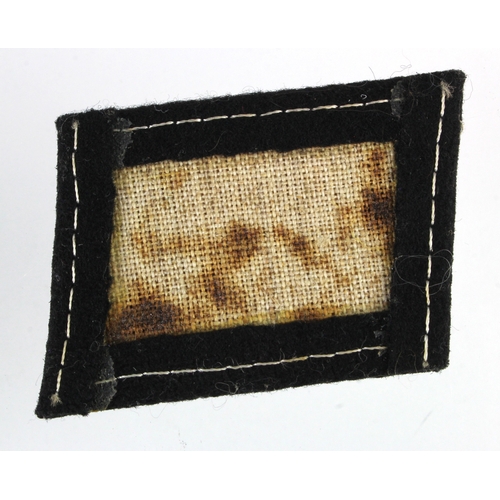 1091 - German SS Totenkopf collar patch Dachu made