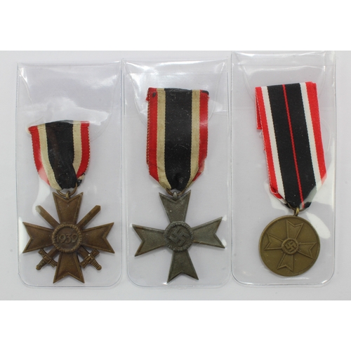 1114 - German War Merit Cross with swords, war merit cross without swords and war merit medal.