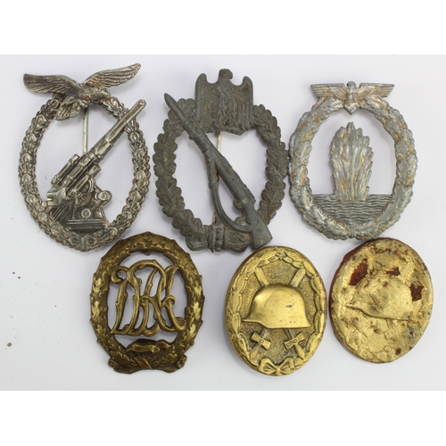 1145 - German WW2 badges and medals all original but damaged.