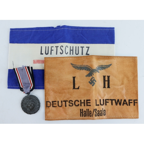 1162 - German WW2 Luftshutze Air raids medal with two armbands.