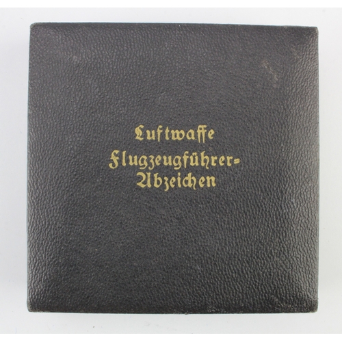 1164 - German WW2 Luftwaffe Pilots badge in its original case, badge maker marked 'GWL'.