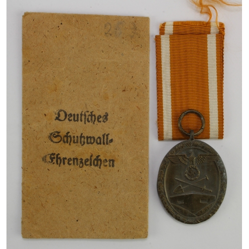 1181 - German WW2 West Wall medal in packet of issue.