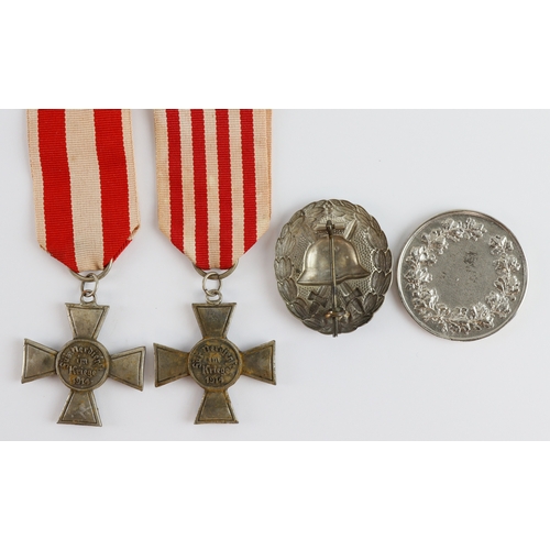 1194 - Imperial German silver wounds badge, two City tribute medals and a medallion.