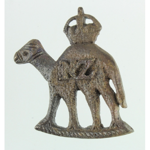 160 - Badge a locally campaign made New Zealand Camel Corps WW1 cap badge.