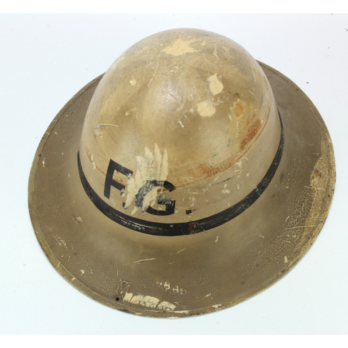 465 - WW2 British Zuckerman Civil Defence helmet with painted finish and 'F.G.' to front. With liner, rim ... 