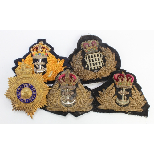 489 - WW2 Royal Navy and Merchant Navy officers hat badges.