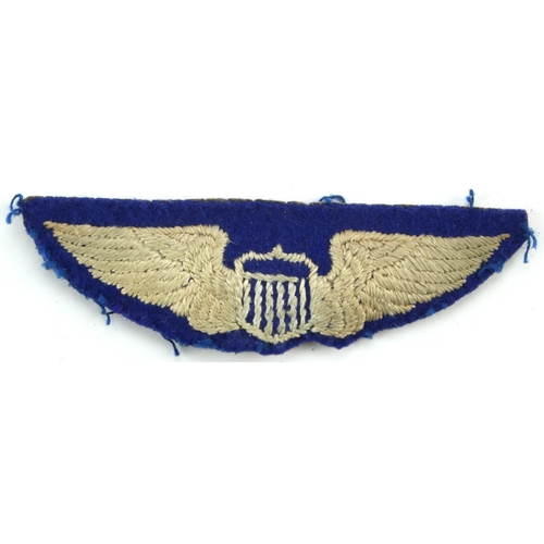 496 - WW2 US Army Air Force cloth Pilot Wing on Combat Crew blue felt, removed from uniform