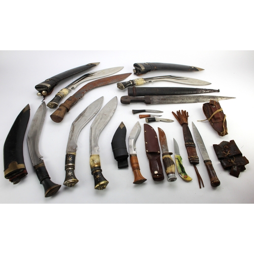 78 - Job lot of old Kukris and a few tribal edged weapons (qty)  Buyer must collect