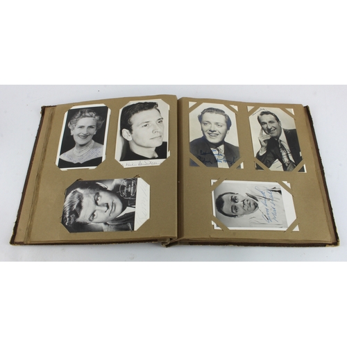 6 - Autographs. A collection of numerous signed picture cards contained in a Postcard album, signers inc... 