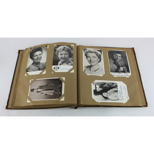 6 - Autographs. A collection of numerous signed picture cards contained in a Postcard album, signers inc... 