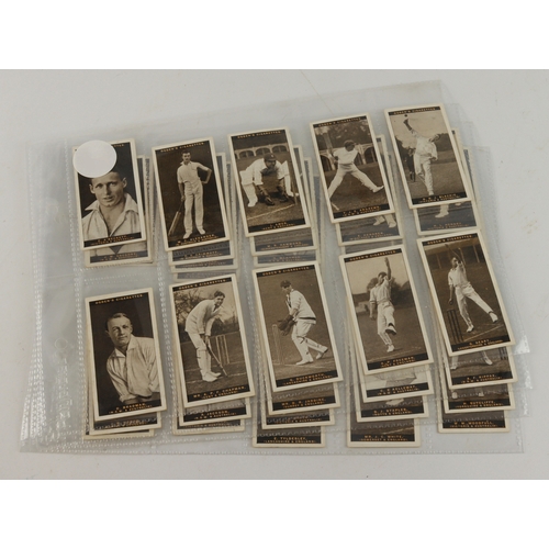 634 - Ogden - Australian Test Cricketers, complete set in pages (Bradman) VG - EXC cat value £160