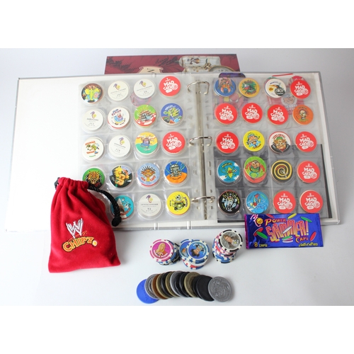 652 - Pogs and Tazos collection contained in 2 albums and loose many different series noted.