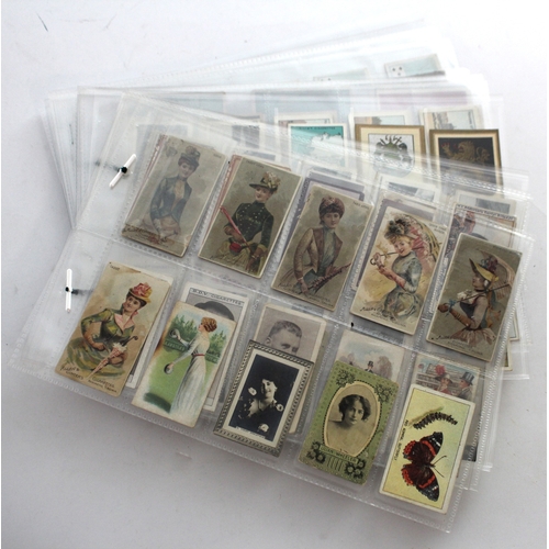 660 - Small collection of over 200 cigarette cards in plastic pages, all overseas issues, many scarcer inc... 