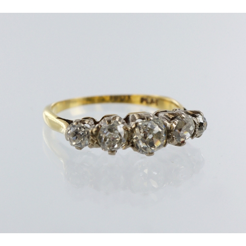 110 - Yellow metal (stamped 18ct) diamond half eternity ring, five round old cuts claw set, total diamond ... 