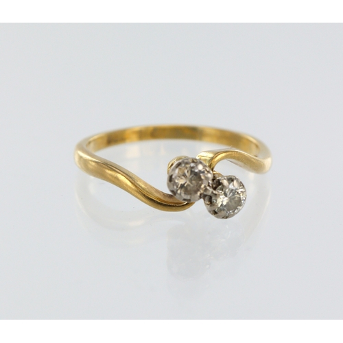 114 - 18ct yellow gold diamond crossover ring, two round brilliant cuts, total diamond weight approx. 0.33... 