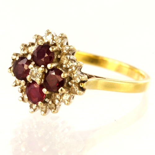 124 - 18ct yellow gold cluster ring set with a central round brilliant cut diamond with four 3.5mm diamete... 