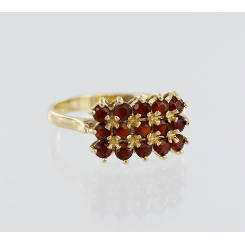 175 - Yellow metal (stamped 14ct) garnet cluster ring, fifteen round 2mm diameter garnets, finger size O, ... 