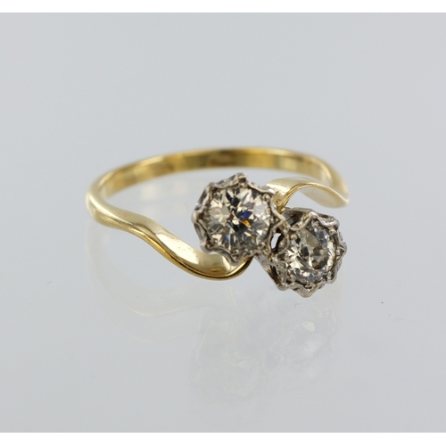 190 - Yellow metal (tests 18ct) diamond crossover ring, two round old cuts, total diamond weight approx. 0... 