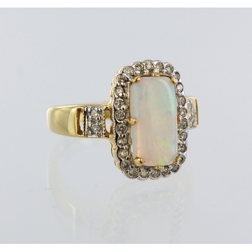 196 - 18ct yellow gold opal diamond cluster ring, opal cabochon 12mm x 6mm, thirty round brilliant cuts, t... 