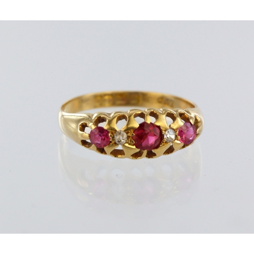 23 - 18ct yellow gold ruby and diamond five stone ring, total diamond weight approx. 0.02ct, hallmarked B... 