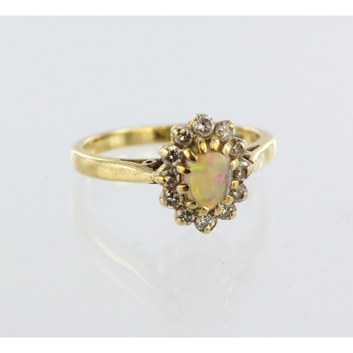 25 - 18ct yellow gold opal and diamond cluster ring, oval opal cabochon 5mm x 4mm, twelve round brilliant... 