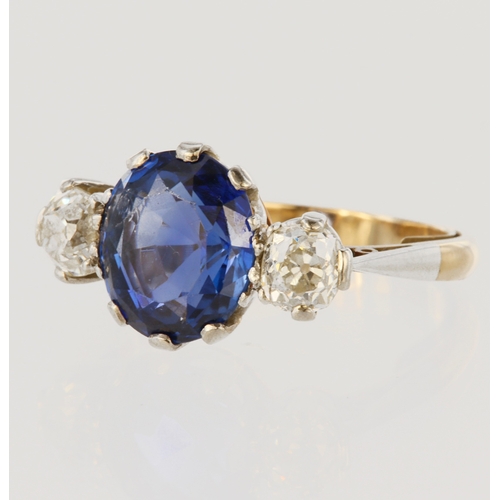 267 - Tested as 18ct yellow gold trilogy ring featuring a central fine blue sapphire with certificate stat... 