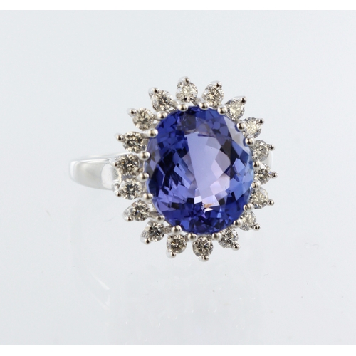 269 - 18ct white gold tanzanite and diamond cluster ring, centre tanzanite measuring 12mm x 10mm, eighteen... 