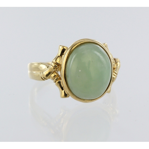 277 - 14ct yellow gold jade dress ring, single oval jade cabochon measuring approx. 12mm x 10mm, finger si... 