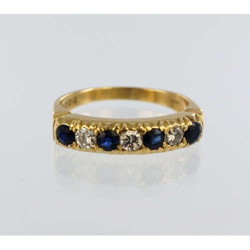 278 - 18ct yellow gold sapphire and diamond half eternity ring, four sapphires, three round brilliant cuts... 