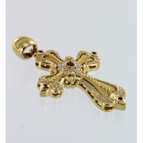 297 - Yellow metal (tests 18ct) ruby and diamond hollow cross pendant, five rubies and twenty six round br... 