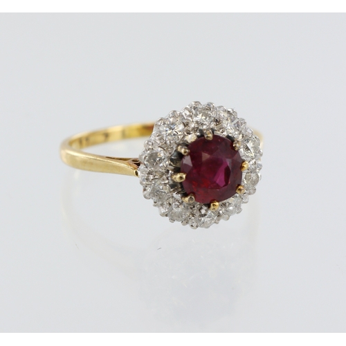 33 - 18ct yellow gold ruby and diamond cluster ring, centre round 6mm diameter ruby, ten round brilliant ... 