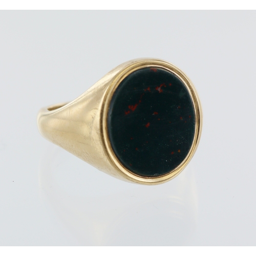 34 - 9ct yellow gold large oval signet ring, 15mm x 13mm bloodstone, finger size U, weight 8.0g