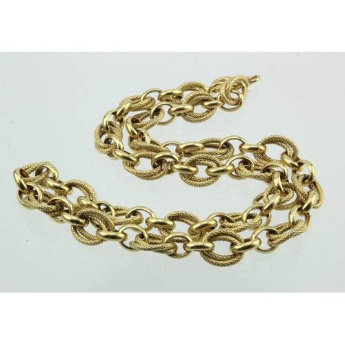 357 - Yellow metal (tests 18ct) hollow necklace, alternate textured and polished links, length 45cm, weigh... 