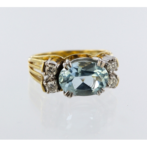 37 - 18ct yellow gold dress ring, central oval aquamarine measuring approx. 12mm x 8mm, four round brilli... 